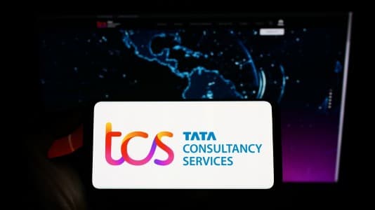 Earnings-Review-TCS-Jul-Sept-consol-PAT-below-view-operating-margin-falls